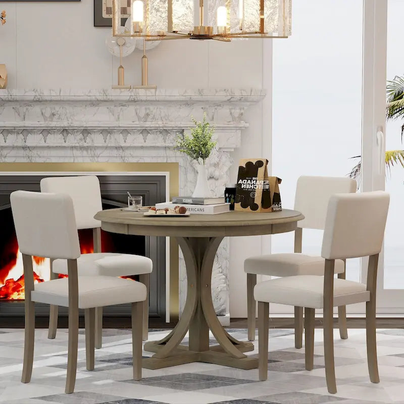 Ensemble de table et chaises de salle à manger rondes rétro 5 pièces, style ferme, avec pieds de table incurvés.