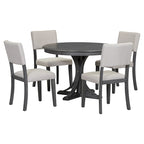 Ensemble de table et chaises de salle à manger rondes rétro 5 pièces, style ferme, avec pieds de table incurvés.