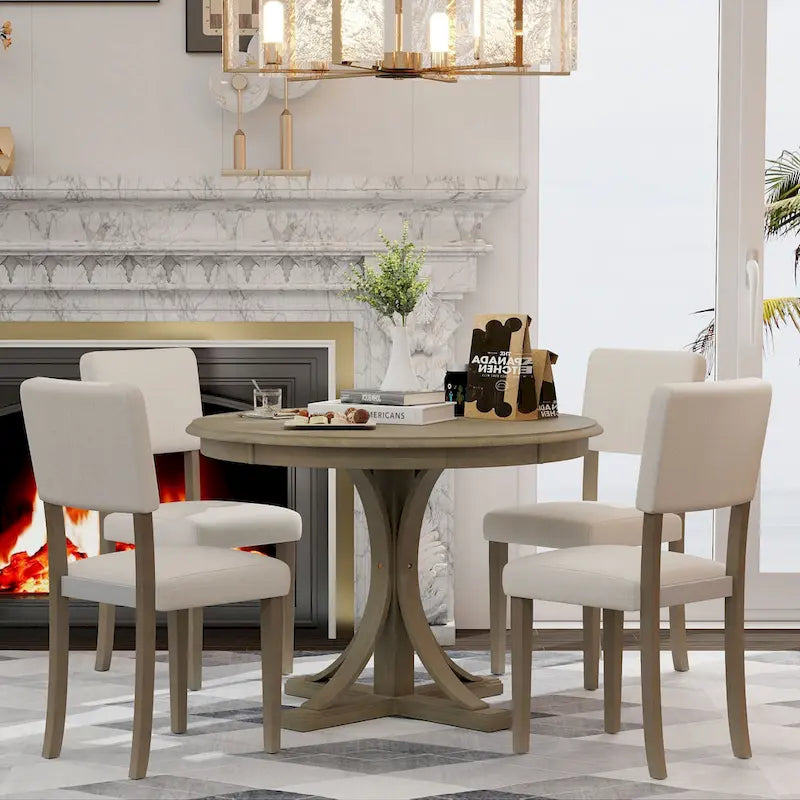 Ensemble de table et chaises de salle à manger rondes rétro 5 pièces, style ferme, avec pieds de table incurvés.