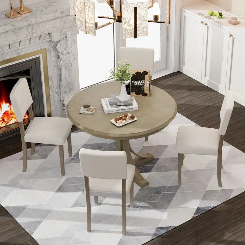Ensemble de table et chaises de salle à manger rondes rétro 5 pièces, style ferme, avec pieds de table incurvés.