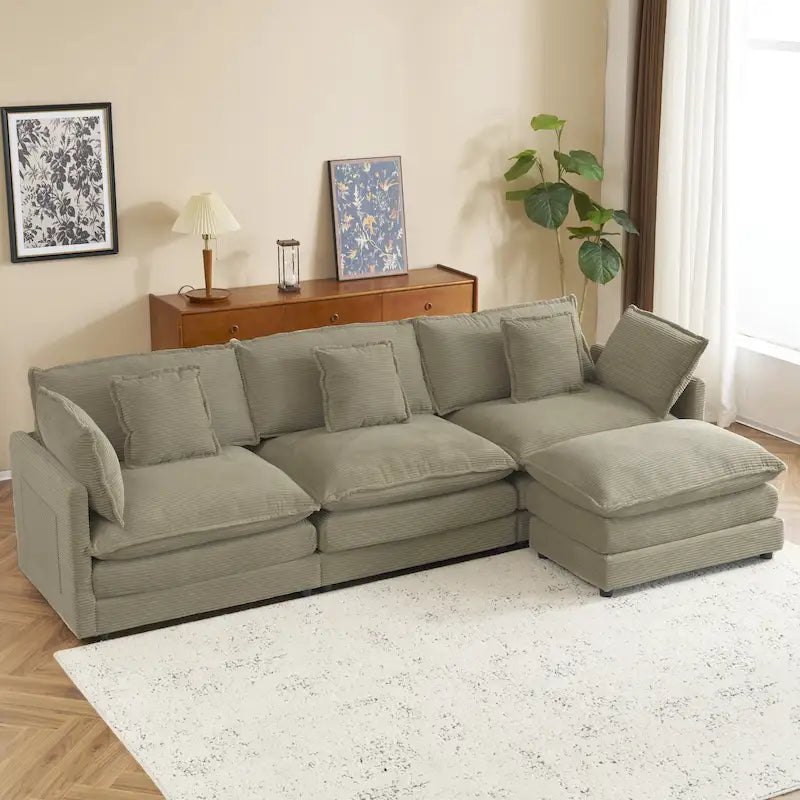Canapé d'angle avec pouf amovible, en velours côtelé, en forme de L, à assise profonde, avec coussins lombaires et poches latérales.