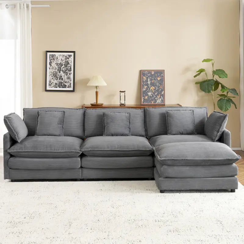 Canapé d'angle avec pouf amovible, en velours côtelé, en forme de L, à assise profonde, avec coussins lombaires et poches latérales.