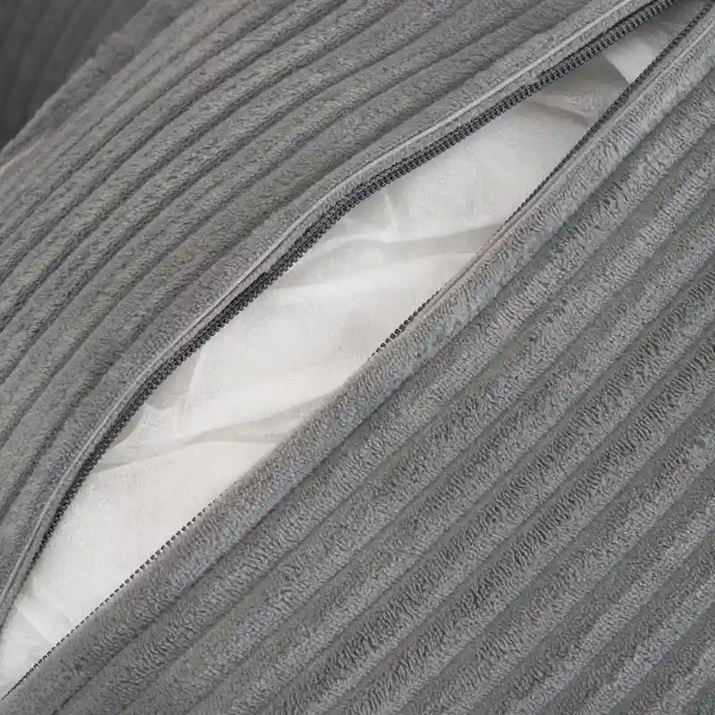 Canapé d'angle avec pouf amovible, en velours côtelé, en forme de L, à assise profonde, avec coussins lombaires et poches latérales.