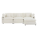 Canapé d'angle avec pouf amovible, en velours côtelé, en forme de L, à assise profonde, avec coussins lombaires et poches latérales.