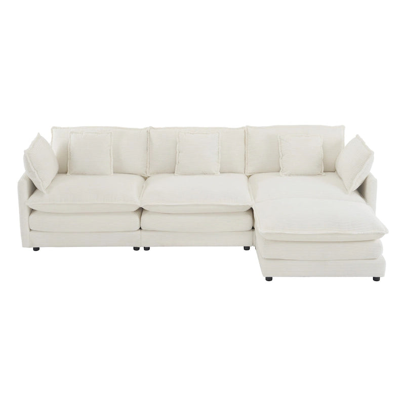 Canapé d'angle avec pouf amovible, en velours côtelé, en forme de L, à assise profonde, avec coussins lombaires et poches latérales.