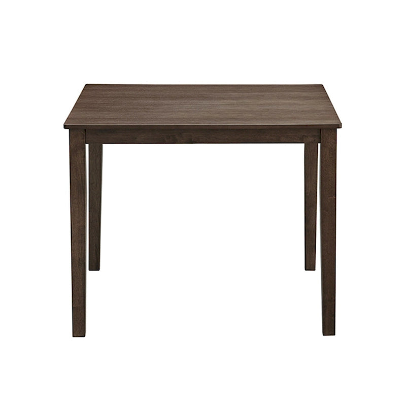 Ensemble table et chaises pour coin repas dans la cuisine : table carrée en bois avec 4 chaises rembourrées.