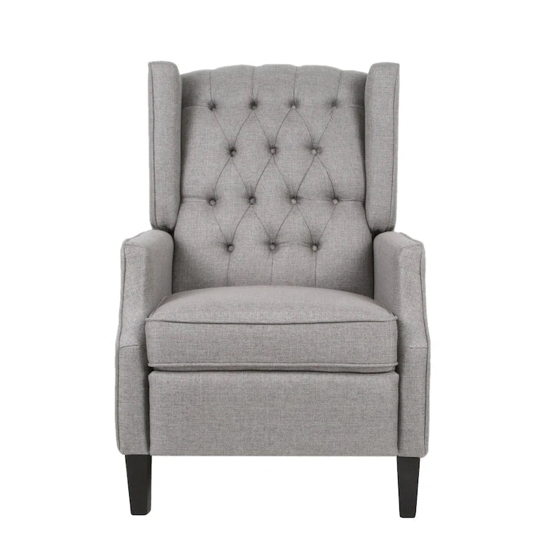 Fauteuil inclinable à oreilles de style mid-century, revêtu de tissu gris, avec repose-pieds et dossier capitonné.