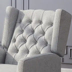 Fauteuil inclinable à oreilles de style mid-century, revêtu de tissu gris, avec repose-pieds et dossier capitonné.