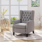 Fauteuil inclinable à oreilles de style mid-century, revêtu de tissu gris, avec repose-pieds et dossier capitonné.