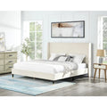 Lit plateforme beige de style queen size avec tête de lit en velours à oreilles