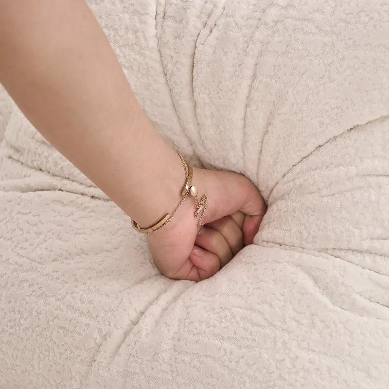 Canapé d'angle modulable incurvé 4 places en tissu chenille de luxe
