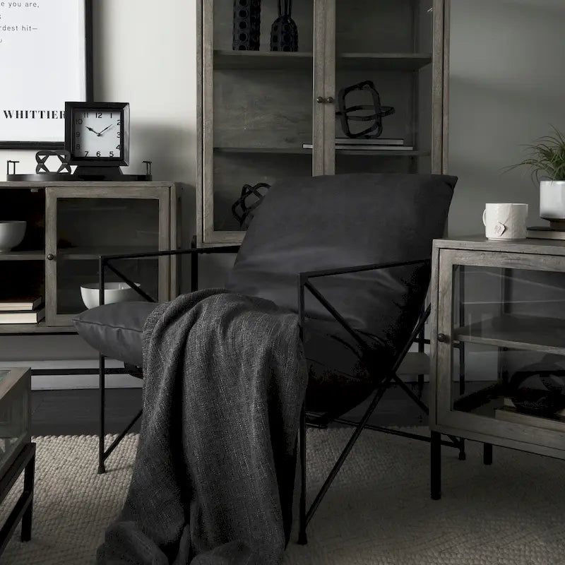 Fauteuil d'appoint Leonidas en similicuir noir avec structure en métal noir