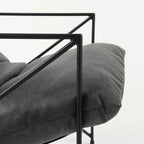 Fauteuil d'appoint Leonidas en similicuir noir avec structure en métal noir