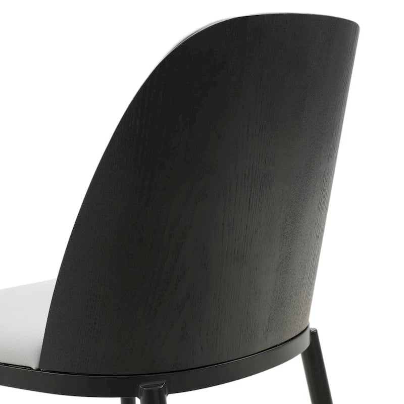 Ensemble de 4 chaises de salle à manger avec assise rembourrée et structure en MDF et acier.