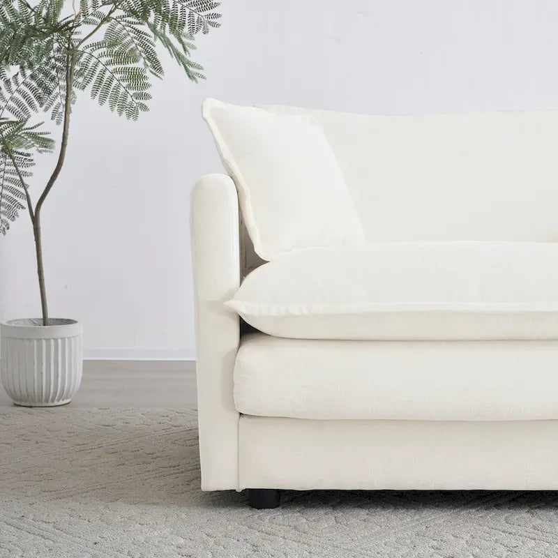Fauteuil de lecture confortable et profond, une place, en tissu chenille blanc, avec 1 coussin décoratif.