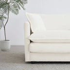 Fauteuil de lecture confortable et profond, une place, en tissu chenille blanc, avec 1 coussin décoratif.
