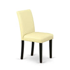 Ensemble de salle à manger East West Furniture : table de cuisine ronde et chaises en similicuir couleur crème au lait de poule, noir (nombre de pièces au choix)