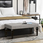 Banc de chevet capitonné de style français, avec pieds en colonnes romaines et pieds épais, idéal pour la chambre, le salon ou l'entrée.