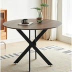 Table de salle à manger de style mid-century avec plateau rond et pied central