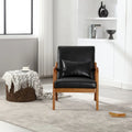 Fauteuil d'appoint moderne en similicuir avec un coussin