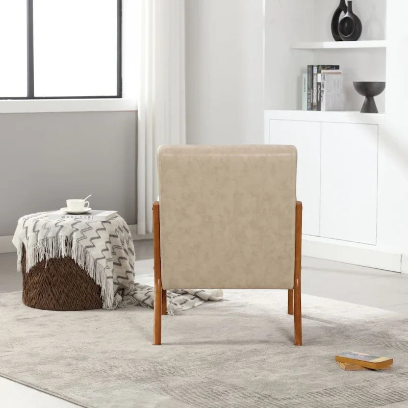 Fauteuil d'appoint moderne en similicuir avec un coussin