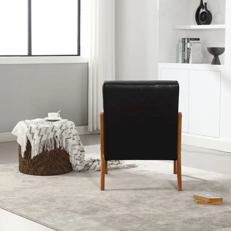 Fauteuil d'appoint moderne en similicuir avec un coussin